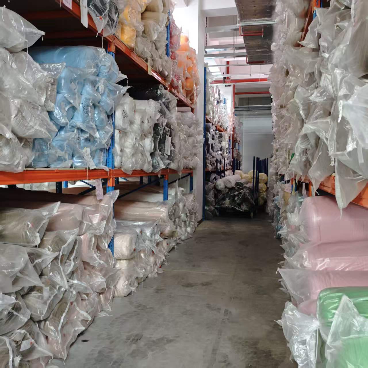 A stocked warehouse aisle in Dongguan