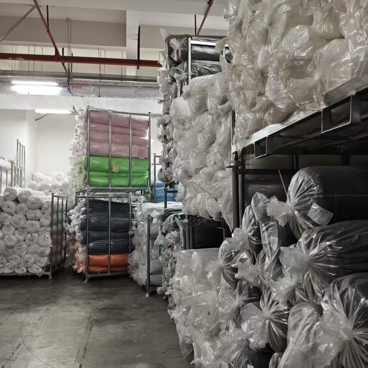 Mixed fabric roll storage in the Dongguan warehouse