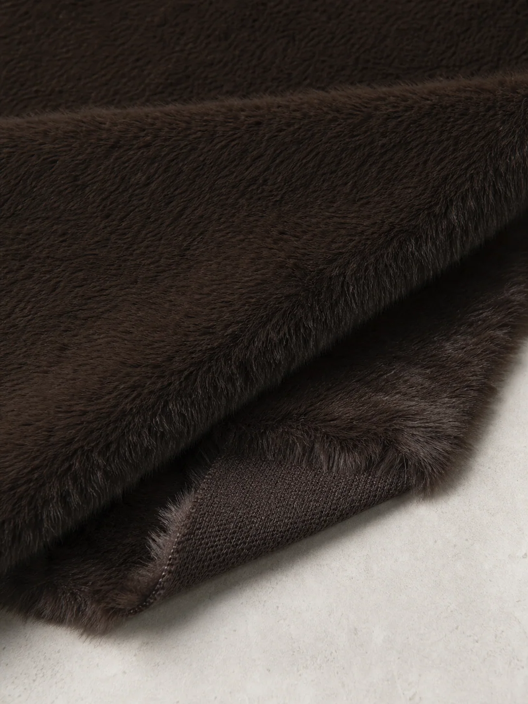 Long-pile Faux Mink fabric shown in a soft fold